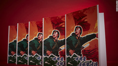 戦争状態の国のような絵だが、北朝鮮のあいさつ状。「ハッピー・ニュー・イヤー」と書かれている