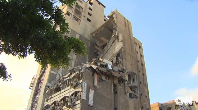 破壊されたガザの建物。死者数は１２４２人に達したという