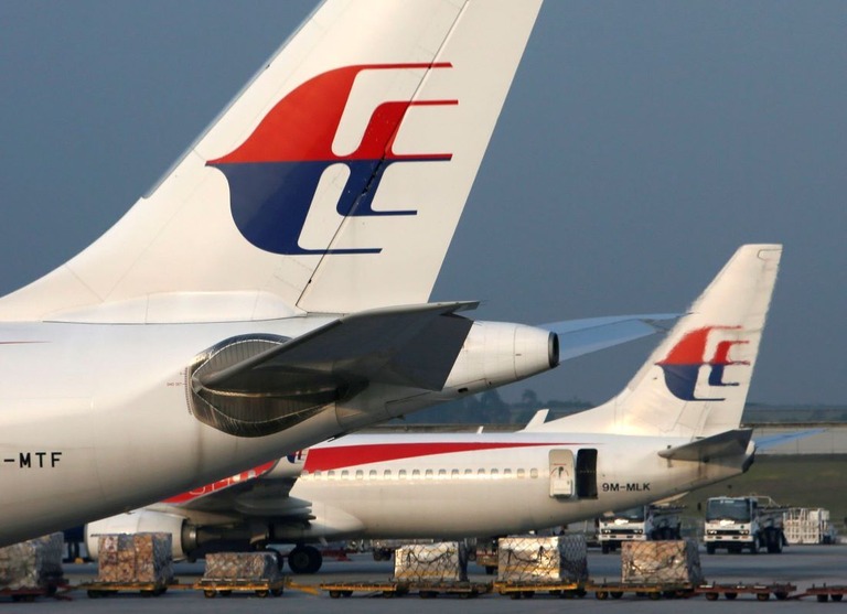 １４日、シドニー国際空港を出発したマレーシア航空機が乗客の迷惑行為によって途中で引き返した/Edgar Su/Reuters