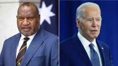 パプアニューギニアのマラぺ首相（左）とバイデン大統領