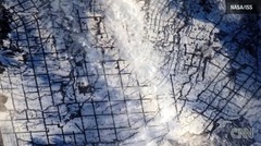 「整然と雪に覆われた日本の田園風景」＝NASA/ISS提供