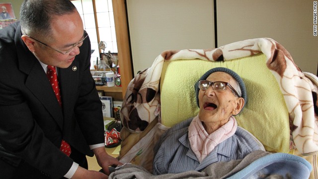 木村次郎右衛門さん（右）が死去