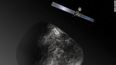 探査機「ロゼッタ」が彗星に近づく様子（想像図）＝ESA提供