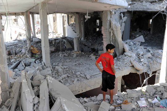 空爆で破壊された建物。停戦の提案は不成立に終わった＝Shareef Sarhan/UNRWA提供