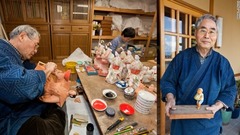 武吉氏は職業人生のすべてを人形作りにささげてきた。１７歳のときに作った最初の作品はスイカを抱える少年の人形だという