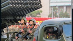 砲撃車両に乗る北朝鮮軍の若い要員