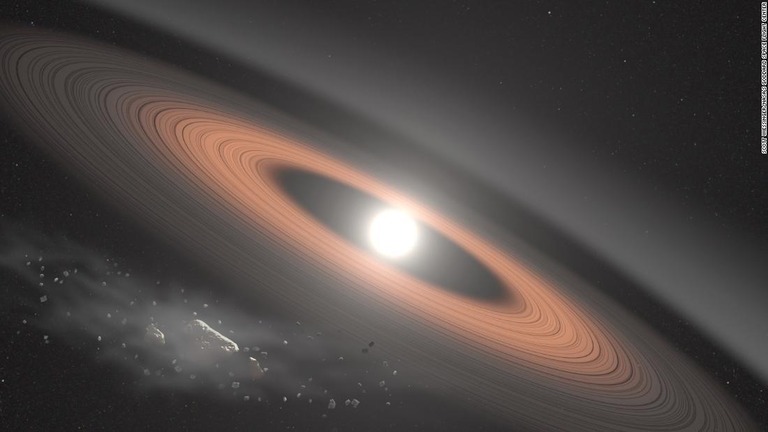 円盤状に広がった環を持つ白色矮星のイメージ図/Scott Wiessinger/NASA's Goddard Space Flight Center