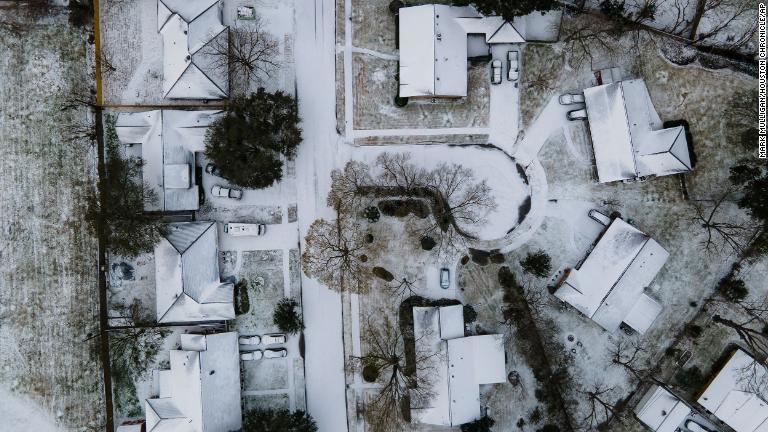 雪に覆われた住宅街＝テキサス州ヒューストン/Mark Mulligan/Houston Chronicle/AP