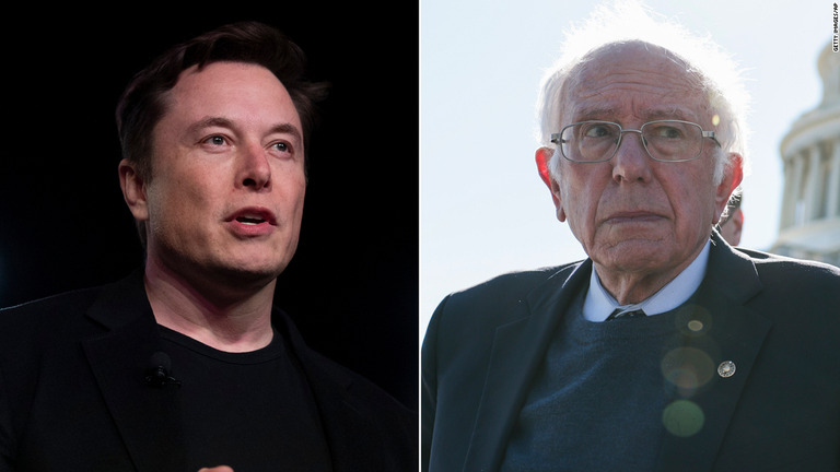 米電気自動車テスラを率いるイーロン・マスク氏（左）とバーニー・サンダース上院議員/Getty Images/AP