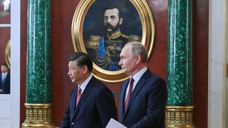 署名式典に出席した中国の習近平・国家主席とロシアのプーチン大統領＝２１日、ロシア首都モスクワ/ (Grigory Sysoyev/Sputnik/AFP/Getty Image