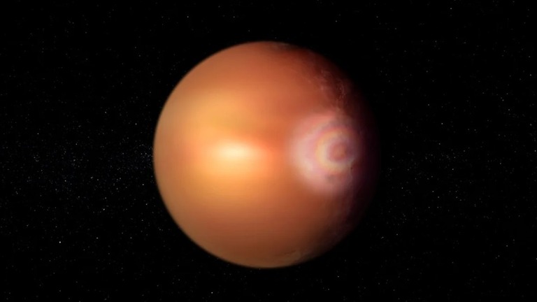 系外惑星の大気に虹色の同心円が浮かび上がる「光輪現象」をイメージした画像/ESA