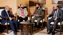 シリア首相、反体制派への権限委譲で合意　ダマスカスで会談
