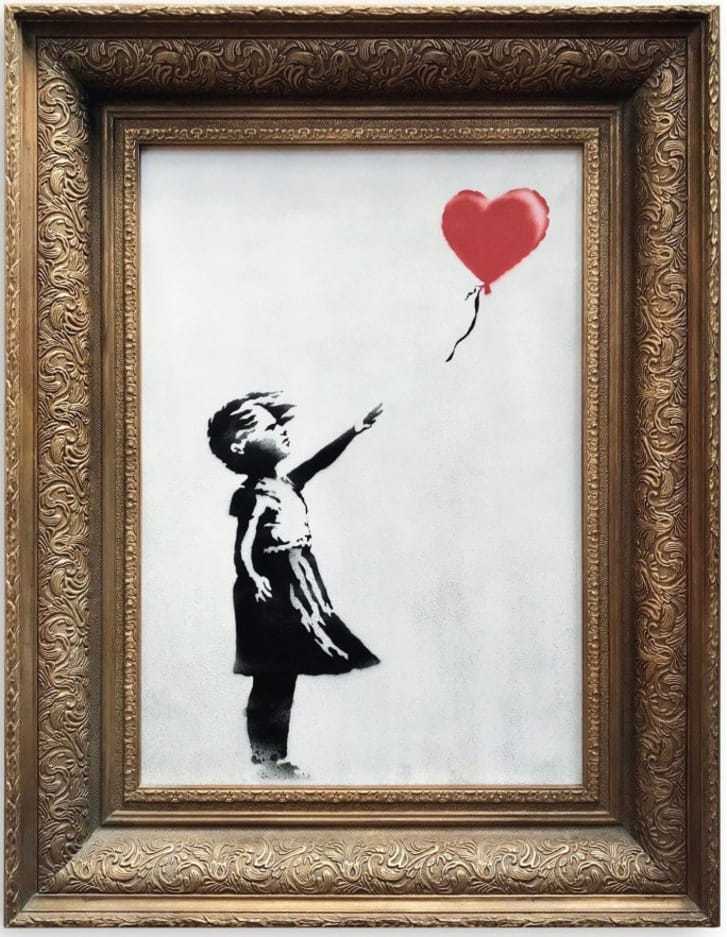 ハート型の赤い風船に手を伸ばす少女を描いた絵画が落札直後にシュレッダーに/Sotheby's
